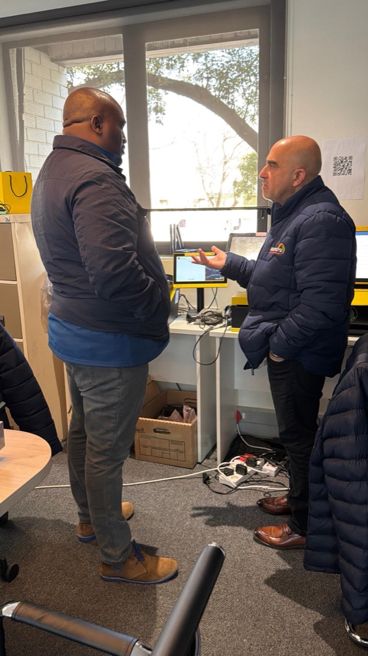 Setting up point-of-sale and lottery terminals for a spaza shop.